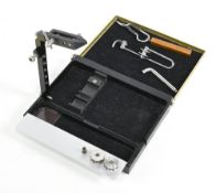 Another Ari-T-Hart Design Wonder – The Ultimate Compact Travel Fly Tying Vice, in a metal hinged lid