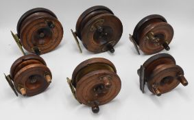 Collection of 6 Nottingham wood/brass star and spineback reels: 4” Eaton Sun starback with