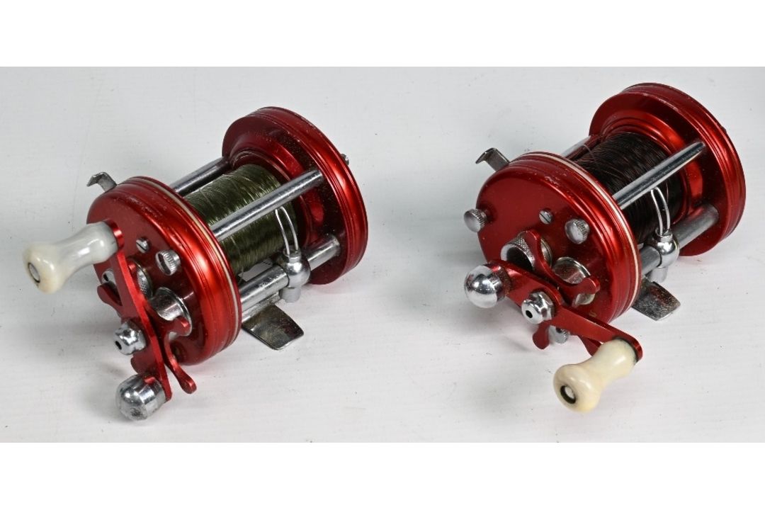 Pair of Abu Ambassador 6000 multiplier reels, both 4 screw end plates, white handles, free spools, - Image 2 of 2