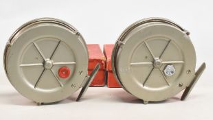Pair of Maxima centre pin reels, 5” narrow spool with moveable cork spindle cover, twin handles (one