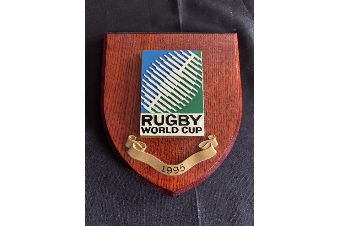 1995 RWC Classic Shield Shaped Rugby Wall Plaque: Brown with colourful IRB RWC logo and title/date