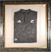 c2000 All Blacks Framed Signed ‘Invincibles’ Rugby Jersey: V large 41” x 36” grey marbling effect-