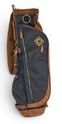 Unused Heritage Golf Sunday Bag in dark blue canvas and brown leather finish, zip pockets and