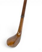 Sunday Golf Walking Stick with dark stained putter head with black fibre sole insert and rear lead