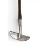 William Gibson ‘The Deadly’ cross line centre shafted putter c1906 with curved sole showing the