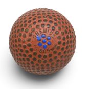 Chemico Bob c1912 red bramble pattern Golf Ball with clear maker’s marks to both poles, with seven