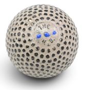The NB bramble pattern rubber core Golf ball c1912, maker’s mark on both poles with three blue
