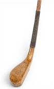 R Dickson golden beechwood putter c1885 with rear lead weight, slim horn insert to the sole and