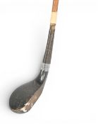 Auchterlonie stamped late c1895 wide body scared neck putter in dark stained persimmon, rear lead