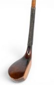R Forgan of St Andrews scared neck wide bodied deep faced dark stained persimmon putter showing