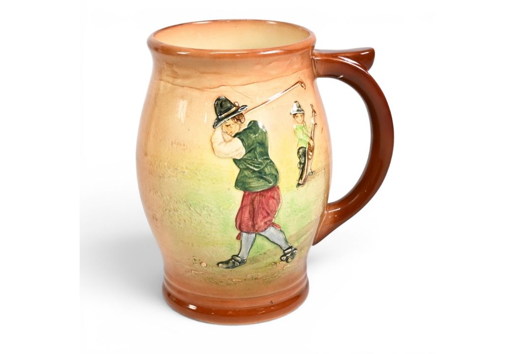Royal Doulton Queensware series Jug c1930s – light brown finish with Crombie style golfers in - Image 1 of 2