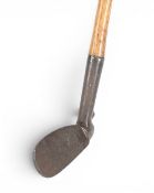 Urquhart adjustable Patent golf iron showing the clear decorative central face markings the pat