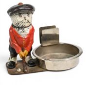 ‘Dunlop Man’ Golfer ashtray and matchbox holder in metal construction with painted Dunlop man,