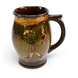 Royal Doulton Kingsware series Tankard c1920s decorated with Crombie style golfers relief