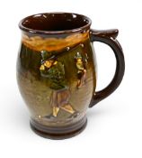 Royal Doulton Kingsware series Tankard c1920s decorated with Crombie style golfers relief