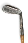 Maxwell niblick by the Glasgow Golf Co showing the Thistle brand mark with wide sole similar