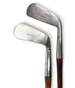 2x D&W Auchterlonie St Andrews smf irons a cleek stamped Manton and Co Calcutta and a lofting iron –