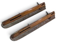 A pair of wooden and brass Victorian Ice Skates (missing leather binding) stamped I. Sorby,