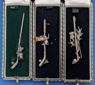 3x Scottish Thistle Golf Brooches and Hat Pin, one silver hat pin, one silver brooch 12 plated