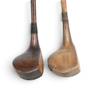 2x Tom Morris of St Andrews socket neck woods a small head in brown stained persimmon brassie