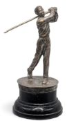 Period silverplated Golfing Figure in full swing on wooden plinth, having a brass club, 13cm tall