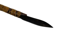 An early 20th century Dayak combined blowpipe-spear, Borneo, with rattan-bound leaf-shape double-