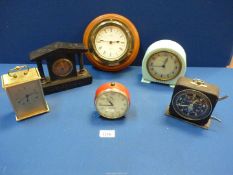 A box of clocks to include: a small slate mantle clock in a classical style, 7" x 5 3/4",