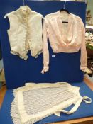 Three vintage garments to include: a boned,