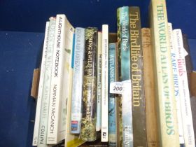 A box of bird books to include The World Atlas of Birds, A Lighthouse Note Book,