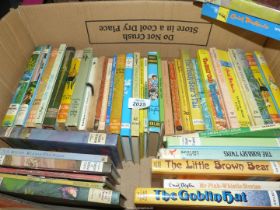 A box of children's novels to include Enid Blyton, R.L. Stevenson etc.