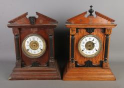 Two Fattorini and Sons, Bradford mantle clocks both featuring carved column supports and Arabic