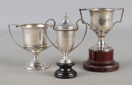 Three sterling silver trophies including miniature lidded example and an engraved example 'Kennel