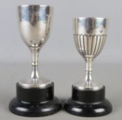 Two sterling silver trophies on turned bases, one assayed for Chester 1924 the other Birmingham 1924