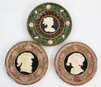 A late 19th century Schutz Blansko majolica cameo charger, 31.5cm diameter, together with two Neo-