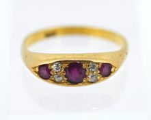 A ruby and diamond set ring, set in 18ct yellow gold, approx 4.1g, size P/Q.