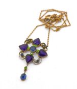 A amethyst, sapphire, demantoid garnet pendant, set in 9ct yellow gold.