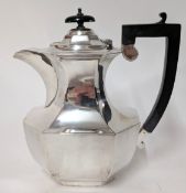 A twentieth century silver coffee pot with wooden handles, hallmarked London 1932, total weight