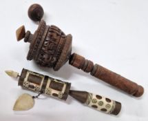 Two Tibetan prayer wheels, to include one of carved wood, and another of brass and carved bone. (2)