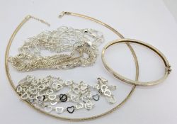 A small collection of silver necklaces and a silver bangle marked 960, total weight approx 67.5g.