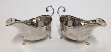 A pair of silver sauce boats, hallmarked Birmingham 1929/1930, weight approx. 7.84 oz.