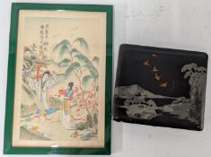 A Chinese watercolour on silk of two figures in a garden, together with a lacquered box.