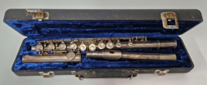 A flute in blue velvet lined black case.