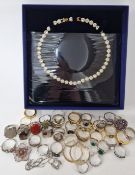 A collection of costume jewellery, to include approx 30 rings, earrings, a pendant, etc, of gilt and