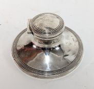 An early twentieth century, silver capstan inkwell, hallmarked rubbed, Chester 1908, total weight