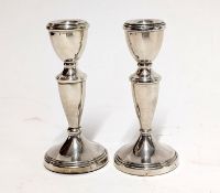 A pair of early 20th century silver candlesticks hallmarked Birmingham (rubbed), total weight approx