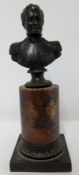 A Bronze bust of Napoleon on a brown stone plinth, height approx 24cm.