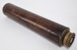 A single draw brass and leather telescope in a leather case.