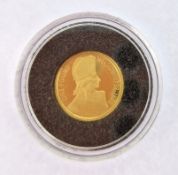 A Queen Elizabeth II Alderney 2005 1/25oz gold Lord Nelson one pound coin.
