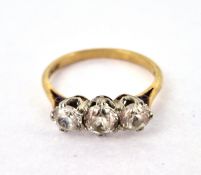 A three stone ring set with cz stones, set in 9ct gold, approx 2.3g, size M.