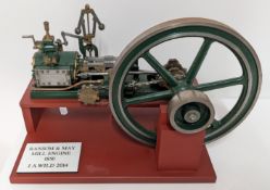A scale model of the 1850 Ransome and May Mill Engine, dark green painted, length approx 29cm, on